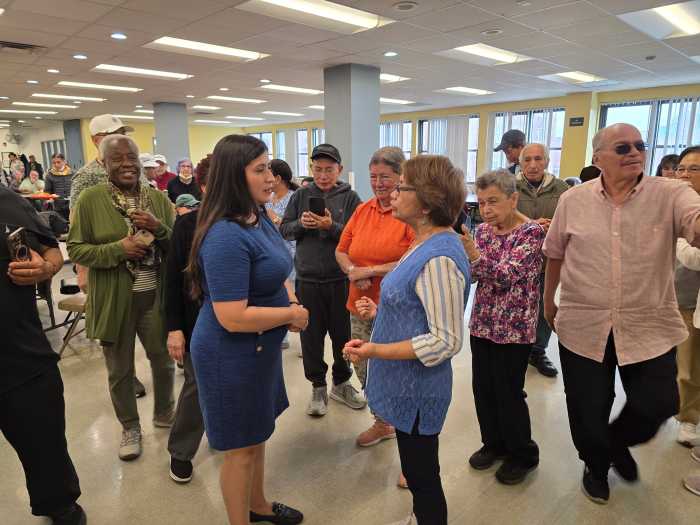 Ramos speaks to seniors at the Elmhurst Older Adult Center after a ribbon-cutting for the center's new sound system on Thursday. Photo: Shane O'Brien